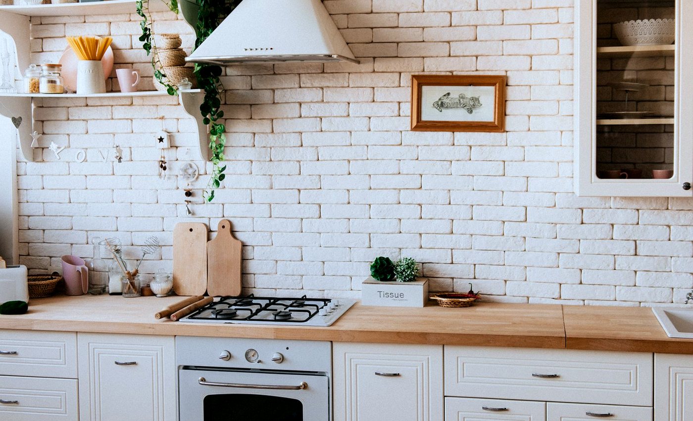 Timber kitchen worktop on cream units